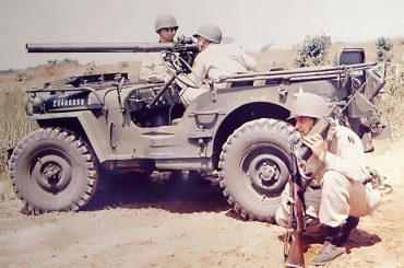 Antique military machinery and jeep