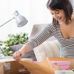 women open box with date & time-based delivery