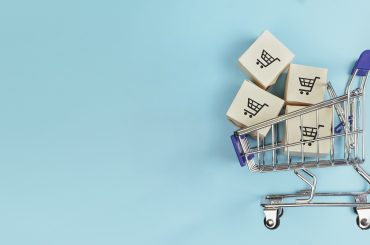 shopping cart with blue background about 2020 retail trends