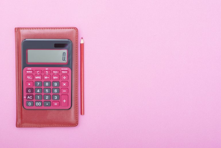 calculator on a pink background
