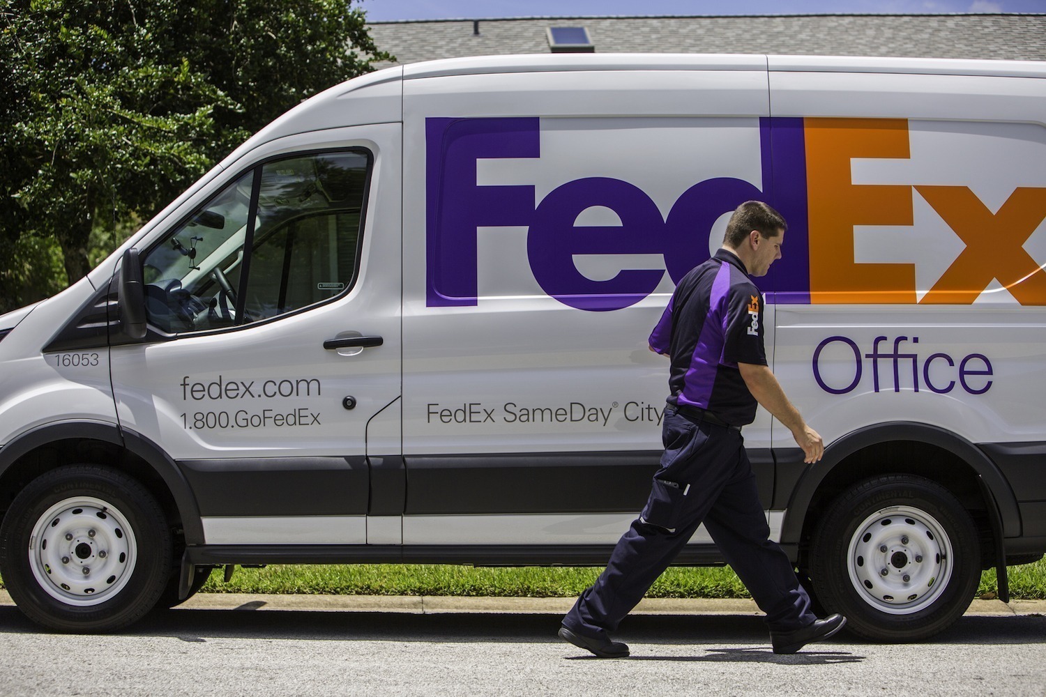 FedEx SameDay City delivery driver and truck