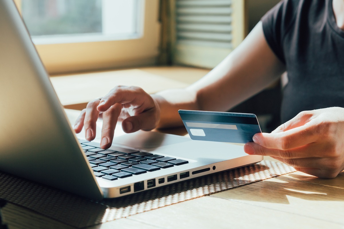 Consumer entering payment for online purchase