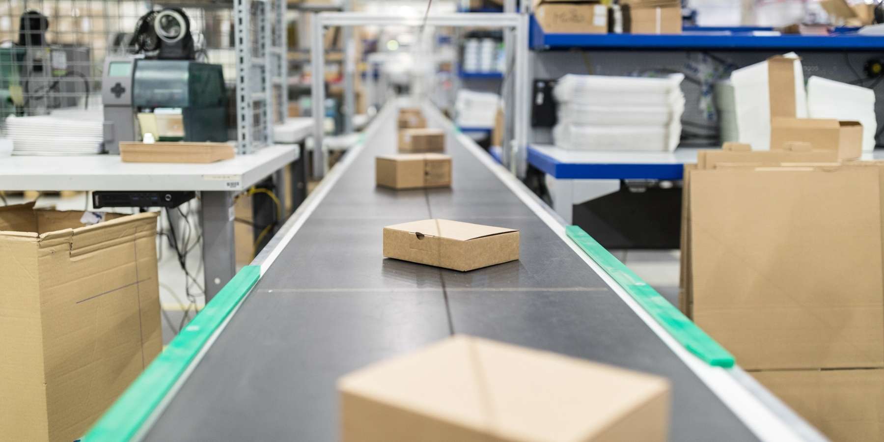 warehouse shipping parcels on conveyor belt